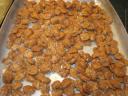 Candied pecans in shallow pan